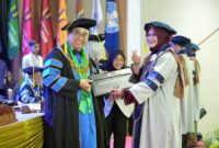 Prosesi wisuda UMK ke-75 di Gedung Auditorium UMK. (Foto: Istimewa)