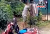 Pelaku saat terpergok mencuri pakaian dalam wanita (Foto:JP)