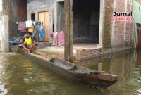 Kondisi banjir di Desa Jetiskapuan, Kecamatan Jati, Kabupaten Kudus. (Foto: J02) 