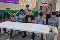 Kapolres Kudus AKBP Heru Dwi Purnomo Eksebisi Game Mobile Legends (Foto:JP)