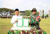 TMMD Sengkuyung Tahap II resmi ditutup. Program betonisasi jalan di Desa Gondoharum diharapkan mendukung akses dan perekonomian warga. (Foto: Diskominfo)