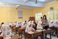 Polres Kudus memberikan edukasi AI dan literasi digital kepada 399 siswa SMKN 1 Kudus sebagai upaya mencegah penyalahgunaan teknologi. Foto: istimewa
