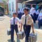 Ilustrasi. Pendistribusian Makan Bergizi Gratis (MBG) di sekolah. (Foto: J05) 