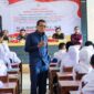 Anggota MPR RI Dr. H. Musthofa, SE, MM menyampaikan materi Sosialisasi Empat Pilar Kebangsaan kepada guru dan siswa SMK Negeri 2 Kudus di Aula SMK Negeri 2 Kudus, Selasa (6/10/2026). Foto: ist